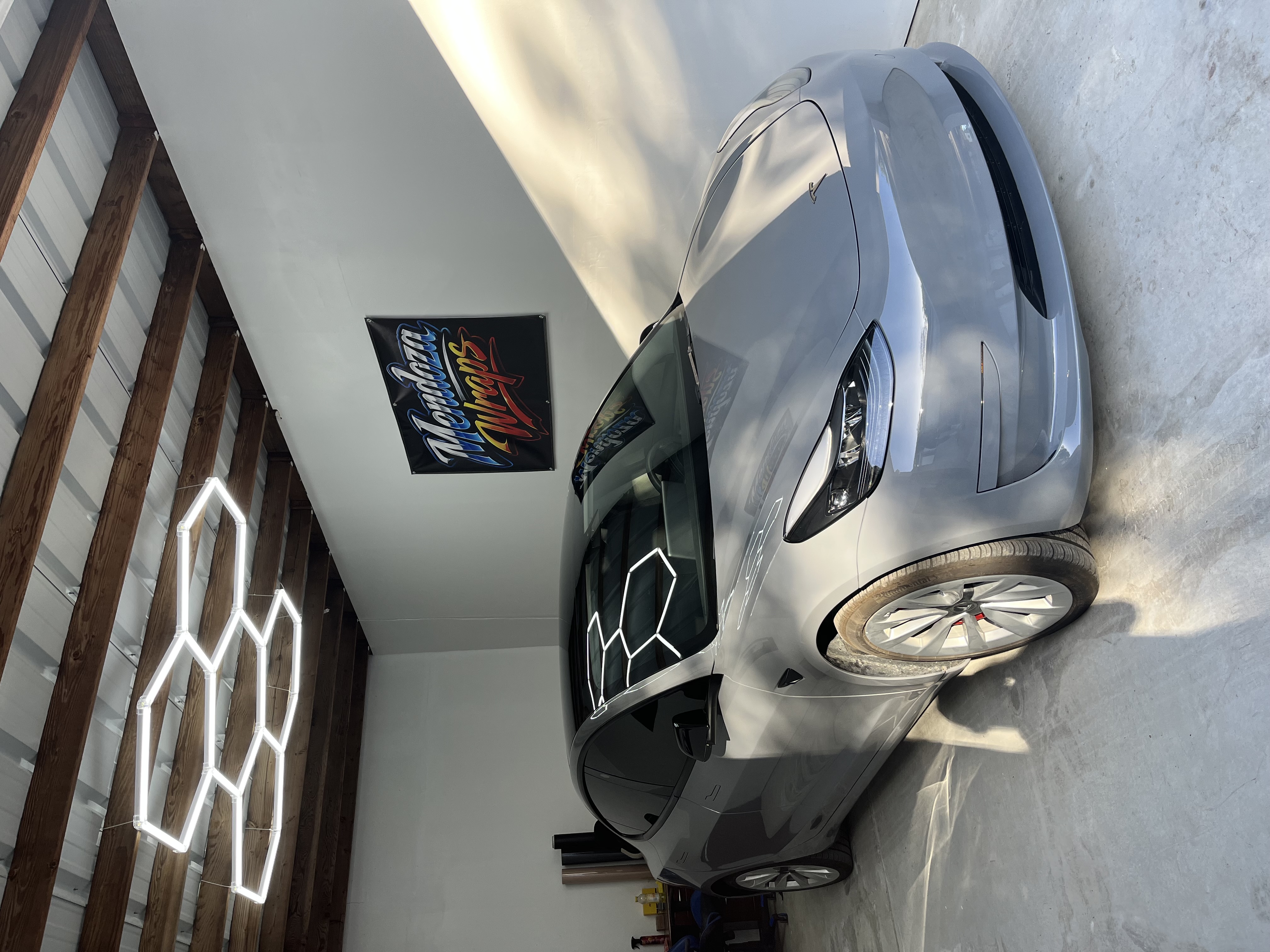 Gray Tesla vehicle wrap project